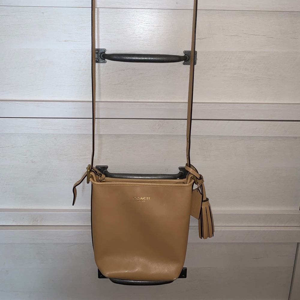 Tan coach purse